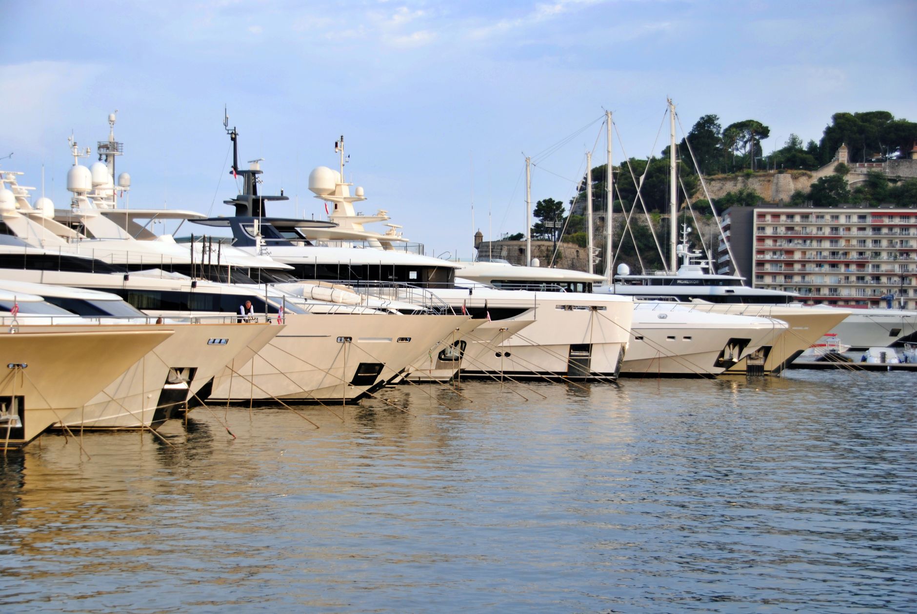 Seabourn ultra-luxury cruise ship in scenic port showcasing elite consortia commission tiers