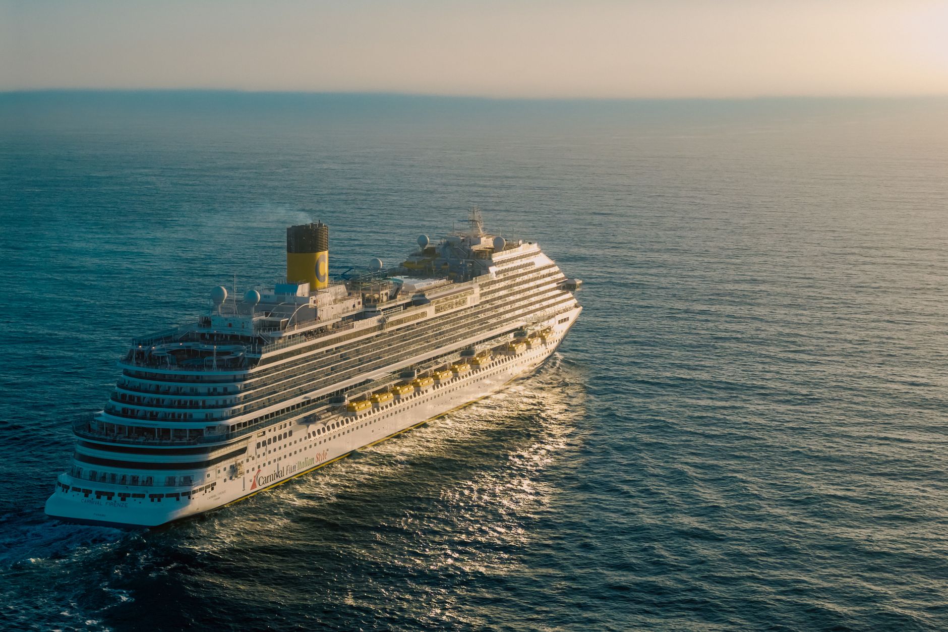 Luxury cruise ship at sunset representing active booking transfer and agency of record protection
